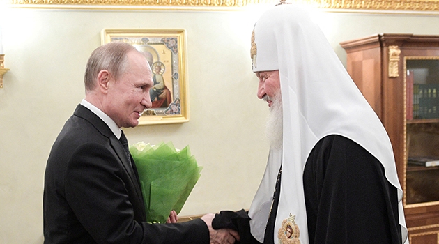 Vladimir Putin och Rysk-ortodoxa kyrkans överhuvud patriark Kirill av Moskva.