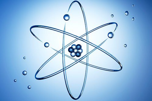 Atomkärna med elektroner mot en blå bakgrund.