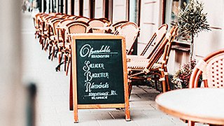 Sign outside cafe in Uppsala